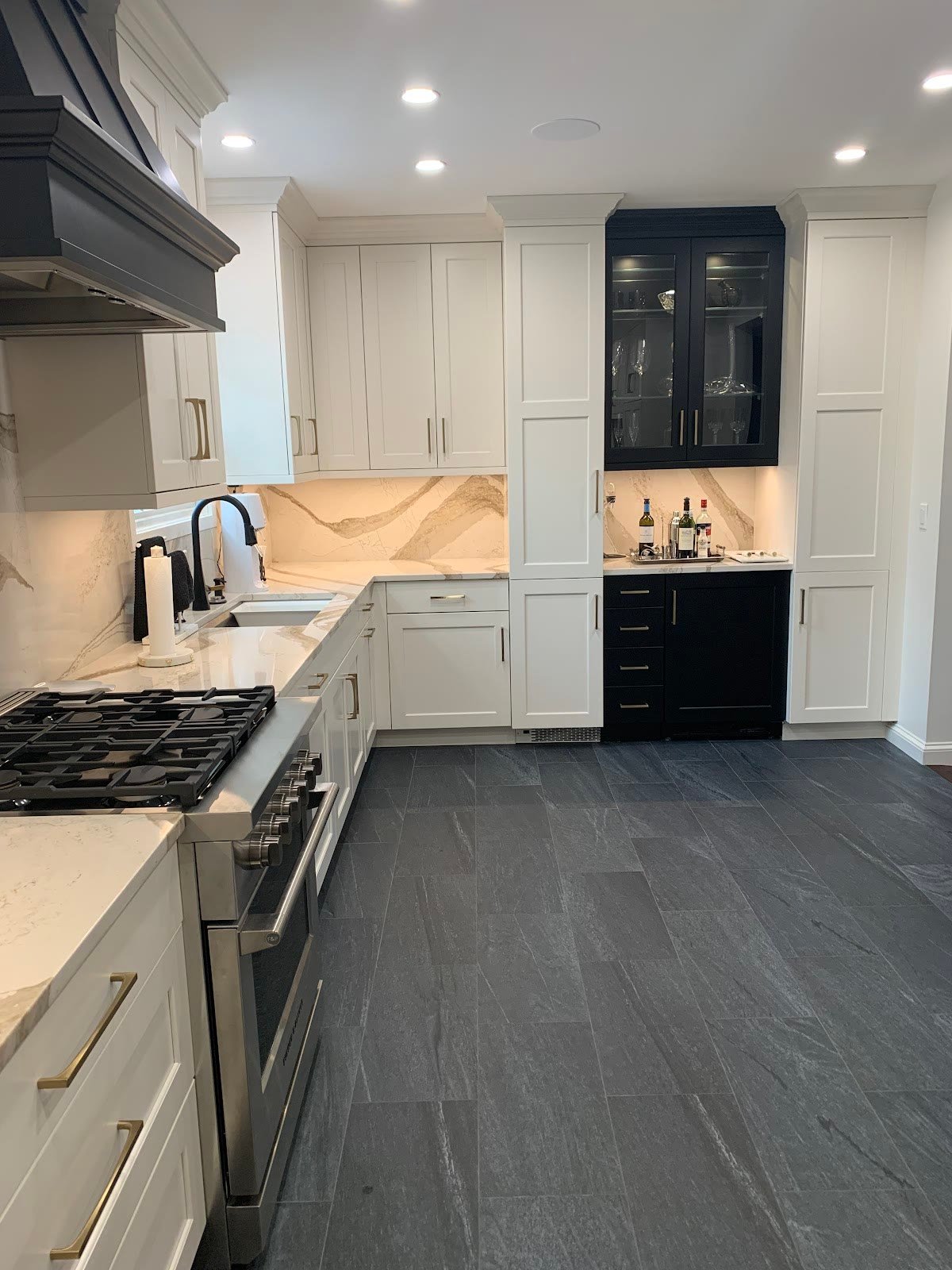 Two-tone shaker kitchen with navy island